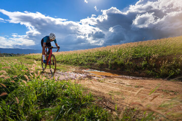 Cyclists practicing on gravel roads