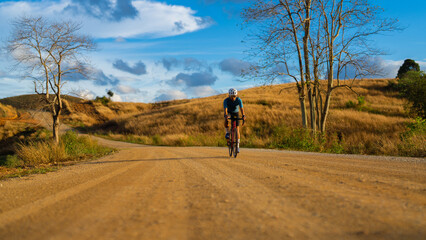 Fototapeta premium Cyclists practicing on gravel roads