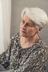 portrait vertical shot caucasian devastated depressed elder woman pensioner. High quality photo