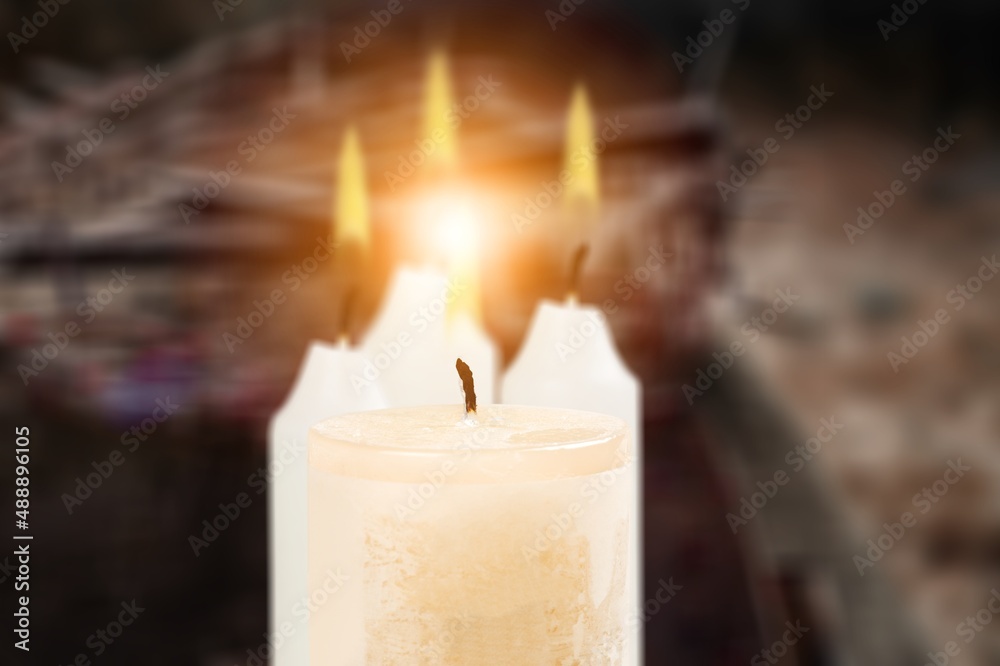 Poster Set of white candles burning, on dark background. Concept of religion, death, memoriam, and peace