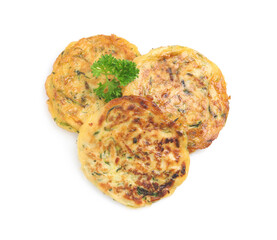 Delicious zucchini fritters with curly parsley on white background, top view