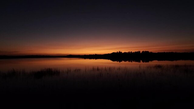 Timelapse of Planet Venus in morning twilight over Nine Mile Pond in Everglades National Park, Florida 4K.