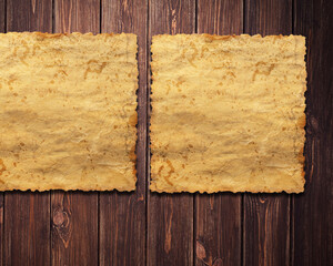 a sheet of vintage paper on wooden background