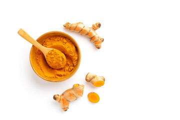 Turmeric powder and turmeric root isolated on white background ,Top view - obrazy, fototapety, plakaty