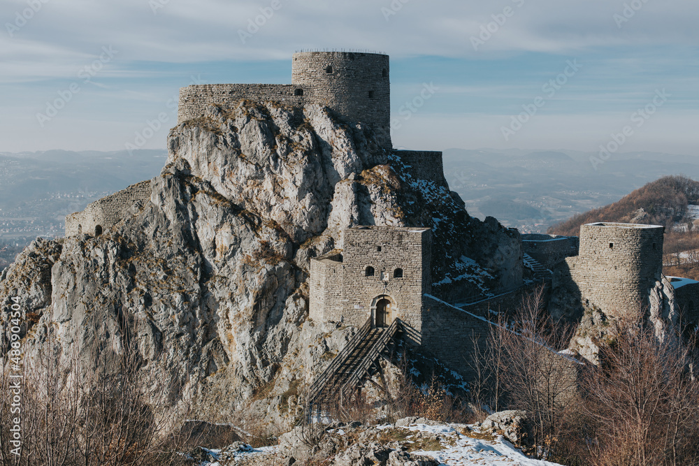 Sticker The famous Srebrenik Fortress against a blue cloudy sky on a sunny day