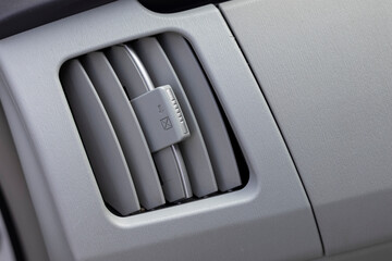 Car air conditioner vent closeup
