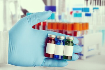 Researcher hold blood sample for New Variant of the Covid-19. Doctor in analysis lab