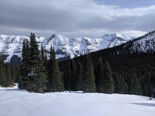 snow covered mountain view from ski hill 