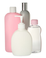 Bottles of baby cosmetic products on white background