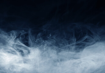Smoke over black background. Fog or steam texture.