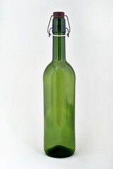 Сlosed green empty bottle for wine isolated on a white background.