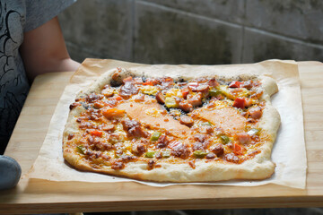 Make delicious pizza out of the hot oven.