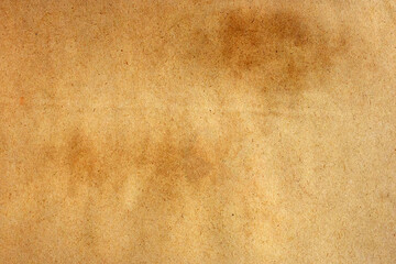 Old brown paper grunge background. Abstract liquid coffee color texture.