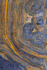 grunge background: curly rust on an old metal surface, toning