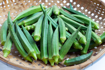 Fresh okra in bamboo basket