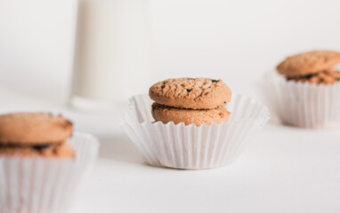 an image of tasty chocolate chip cookies with milk in food stylist theme, dessert restaurant,