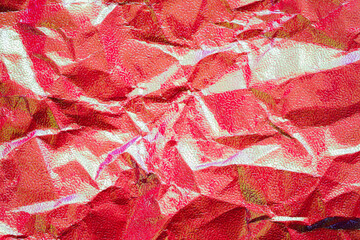 Wrinkled shiny red paper texture