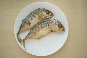 fried fish on white plate