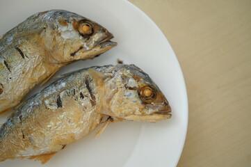 fried fish on white plate