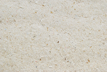 Brown fibrous recycled craft paper texture as background
