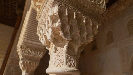 Alhambra palace in Granada, Andalusia, Arabian style interior detail of moorish castle of Alhambra in Spain, famous tourist destination 