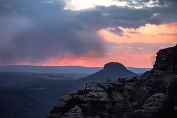 Schrammsteine at sunset from the viewing platform. Schrammsteine Mountains in Elbe Sandstone Mountains in Saxon Switzerland, Germany.