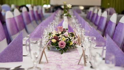 A beautifully designed wedding table. Dinner table with wedding decorations. Wedding decor. 