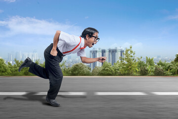 Asian nerd with ugly face running on the street