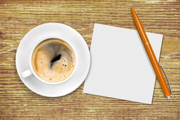 Paper with a cup of coffee, product or business review of the recent year