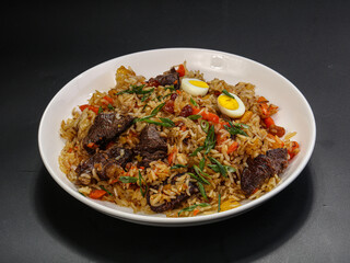 Uzbek traditional plov - rice with meat