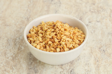 Crunched roasted peanut in the bowl