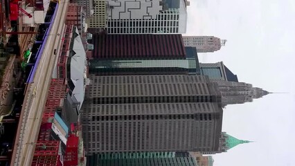 Panoramic view from Brooklyn bridge of New York Manhattan financial district and skyscrapers. VERTICAL format