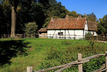 Fototapeta na wymiar rural landscape with a white farmhouse, Bokrijk, Belgium