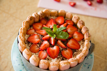 cake with fresh strawberries and mint