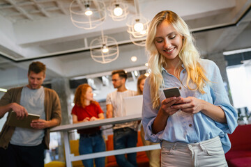 Group of successful business people working together in office. Business technology work concept