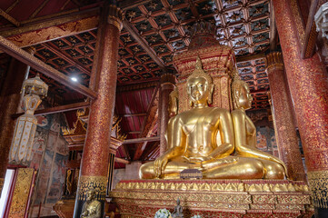 Nan.thailand-19.12.2020:Golden buddha statue in Wat Phumin at nan city thailand.Wat Phumin is the most attractive temple in the town of Nan.