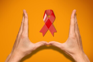 Blue ribbon cancer. Awareness prostate cancer of men health in November. Ribbon in hands