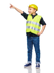 building, construction and profession concept - happy smiling little boy in protective helmet and safety vest pointing finger over white background