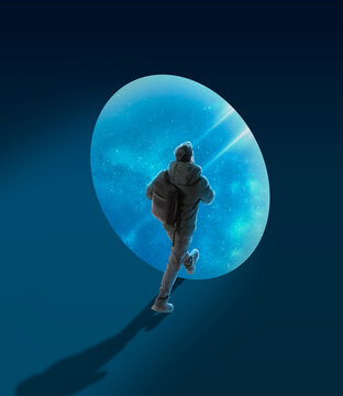 Conceptual creative artwork with young man walking on outer space background. Concept of astronautics, dreams, astronomy, art, Day of Human Space Flight
