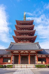 Front view of Japanese Buddhist five-storeyed pagoda at Senso-ji Temple. The temple is oldest ancient Buddhist temple and famous landmark located in Asakusa, Tokyo, Japan, Asia.