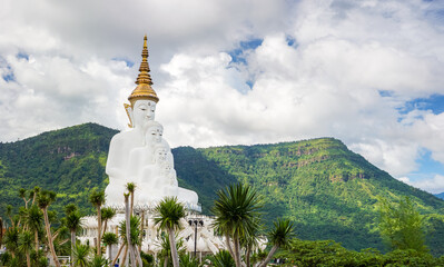Great Vihara of 5 Buddha Images at Wat Phra That Pha Son Kaeo with mountain background. It is in Khao Kho District, Phetchabun, Thailand, Southeast Asia.