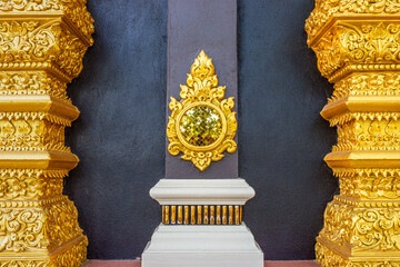 Religion art of Thai Buddhism on outside temple wall of Wihan Somdet Ong Pathom. The building is at...