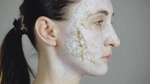 Problem skin after cleansing woman face with regenerating cream. Care treatment cosmetic products concept