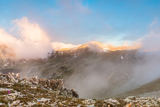 Amazing golden sunlight over the peak (Peak of Bastiments, Pyrenees Mountains, Catalonia, Spain, Ulldeter)