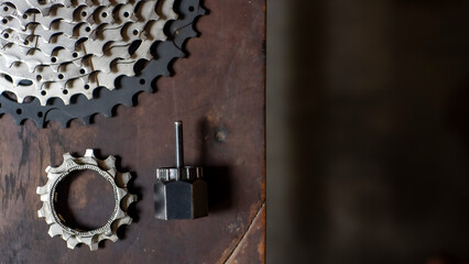 Bicycle tools on the wooden table with negative space for words