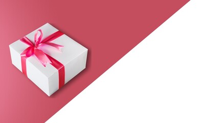 Beautiful gift box with ribbon wrapped as bow abstract background