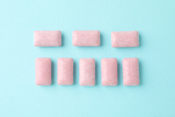 Chewing or bubble gum on blue background