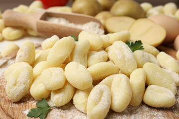 Concept of cooking with raw potato gnocchi, close up