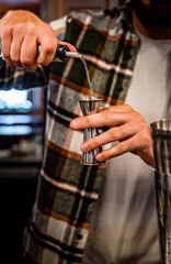 man hand bartender making cocktail on the bar counter