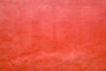 Red textured dirty rough cement concrete background. Grunge wall for pattern and background.